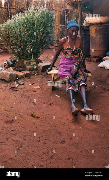 old-african-woman-from-zambia-village-sitting-outside-2H0KEMT.jpg