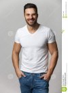 handsome-young-man-boy-posing-white-t-shirt-jeans-hands-pockets-68171943.jpg