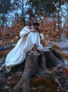 young-sad-princess-very-long-hair-sits-large-stump-old-tree-waits-her-prince-girl-has-vintage-...jpg