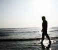 desktop-wallpaper-sad-boy-walking-alone-walking-alone-beach.webp